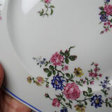 4 flat plates by Bernardaud, Limoges porcelain, floral decoration from the 1920s to 1950s.
