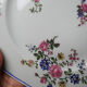 4 flat plates by Bernardaud, Limoges porcelain, floral decoration from the 1920s to 1950s.