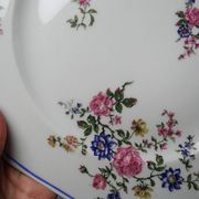 4 flat plates by Bernardaud, Limoges porcelain, floral decoration from the 1920s to 1950s.