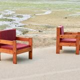 Pair of pine fireside chairs, France, 1960s, "raspberry" cushions