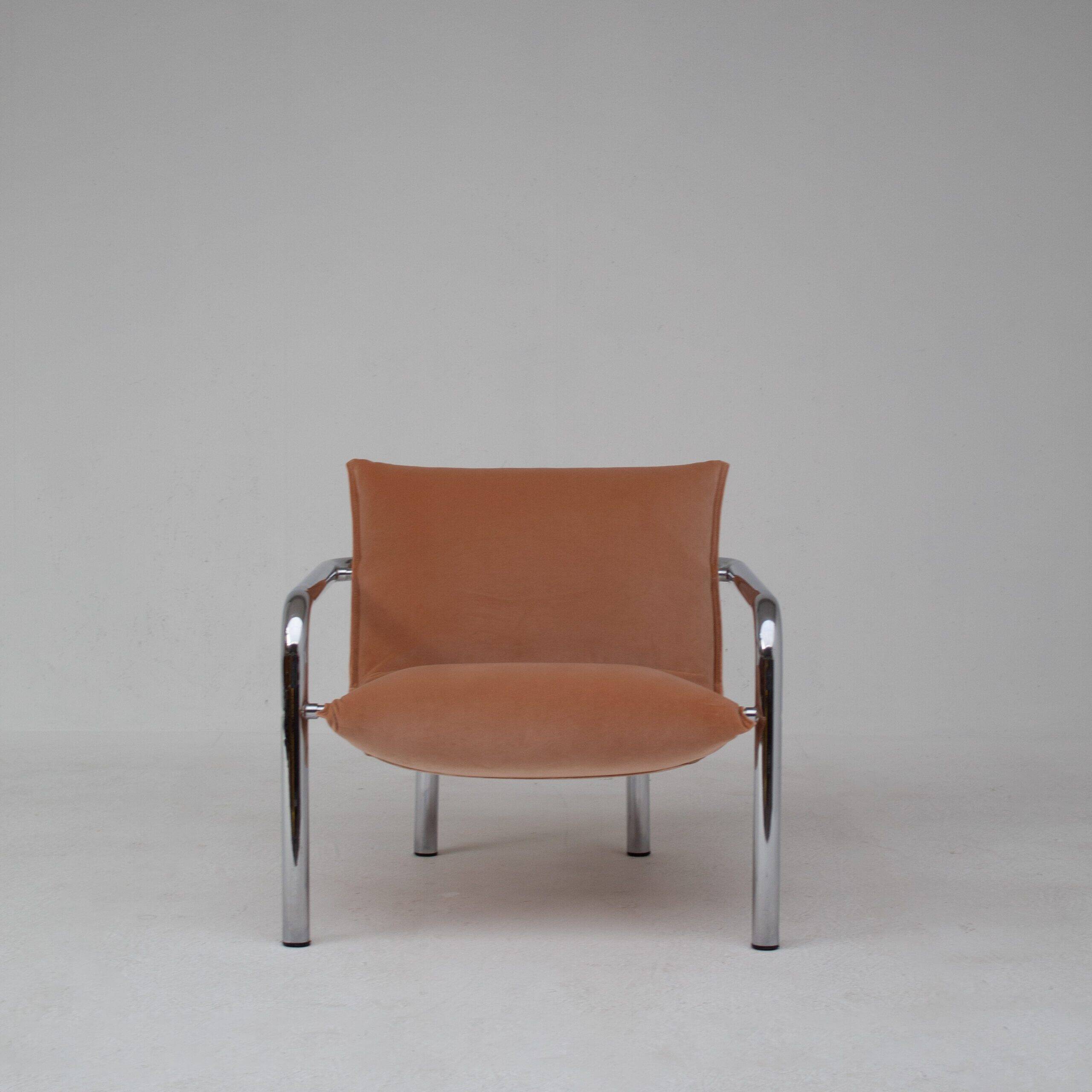 Pair of tubular armchairs in salmon velvet