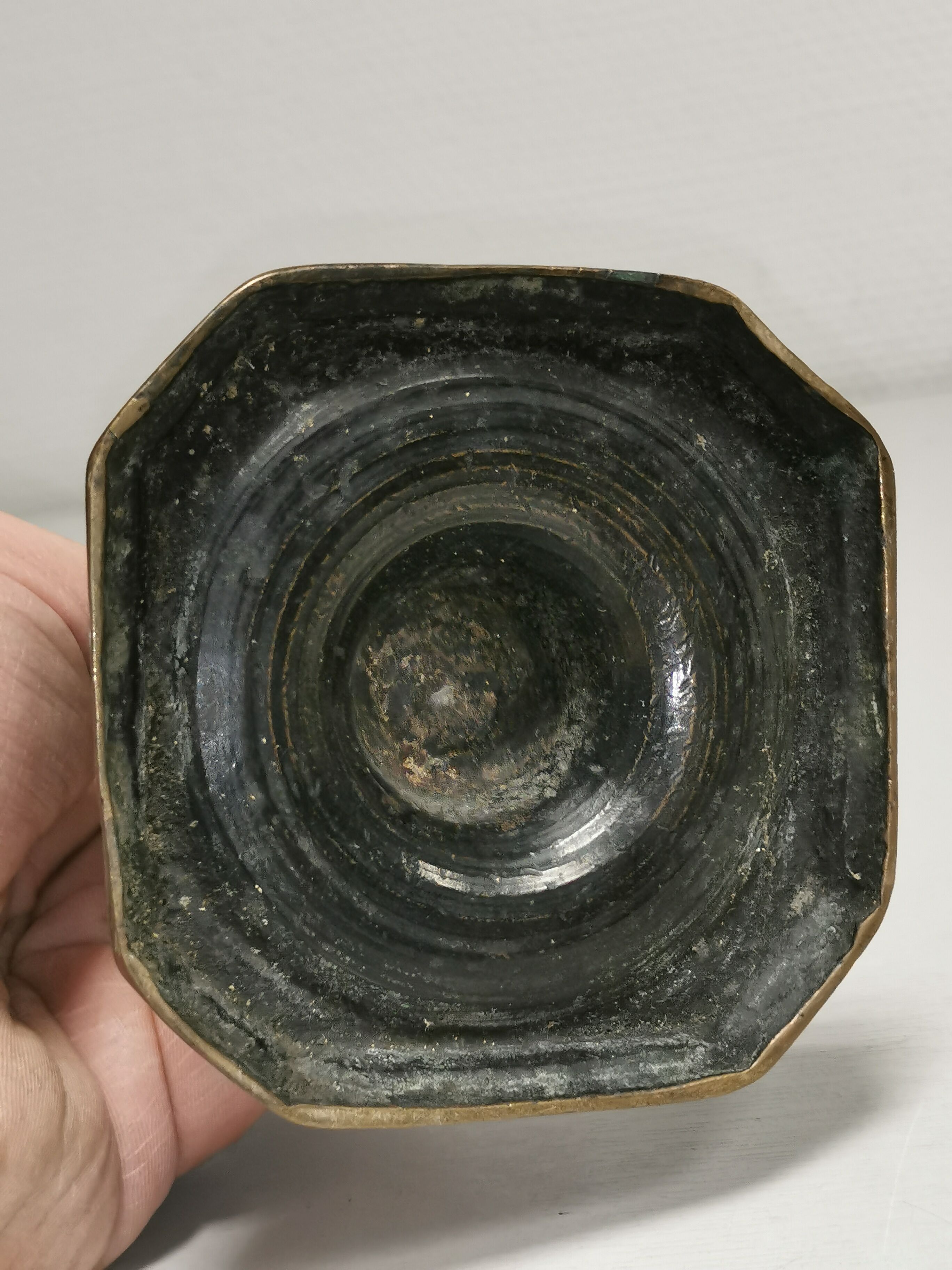 Old bronze candle holder, seventeenth century
