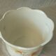 Cache pot in earthenware tiger lily St Michael England