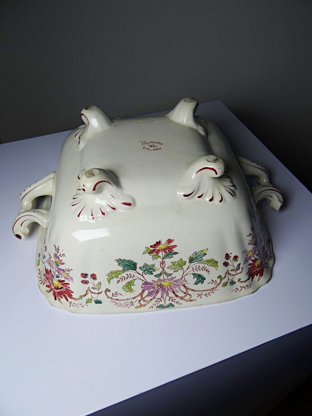 Antique Longchamp soup tureen/vegetable dish with polychrome daisies in ironstone.