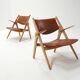 Vintage CH28 Sawbuck Lounge Chairs by Hans J. Wegner for Carl Hansen, 1960s, Set of 2