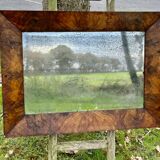 Antique mirror with elm burl molding, heavily demercurized, in its current condition