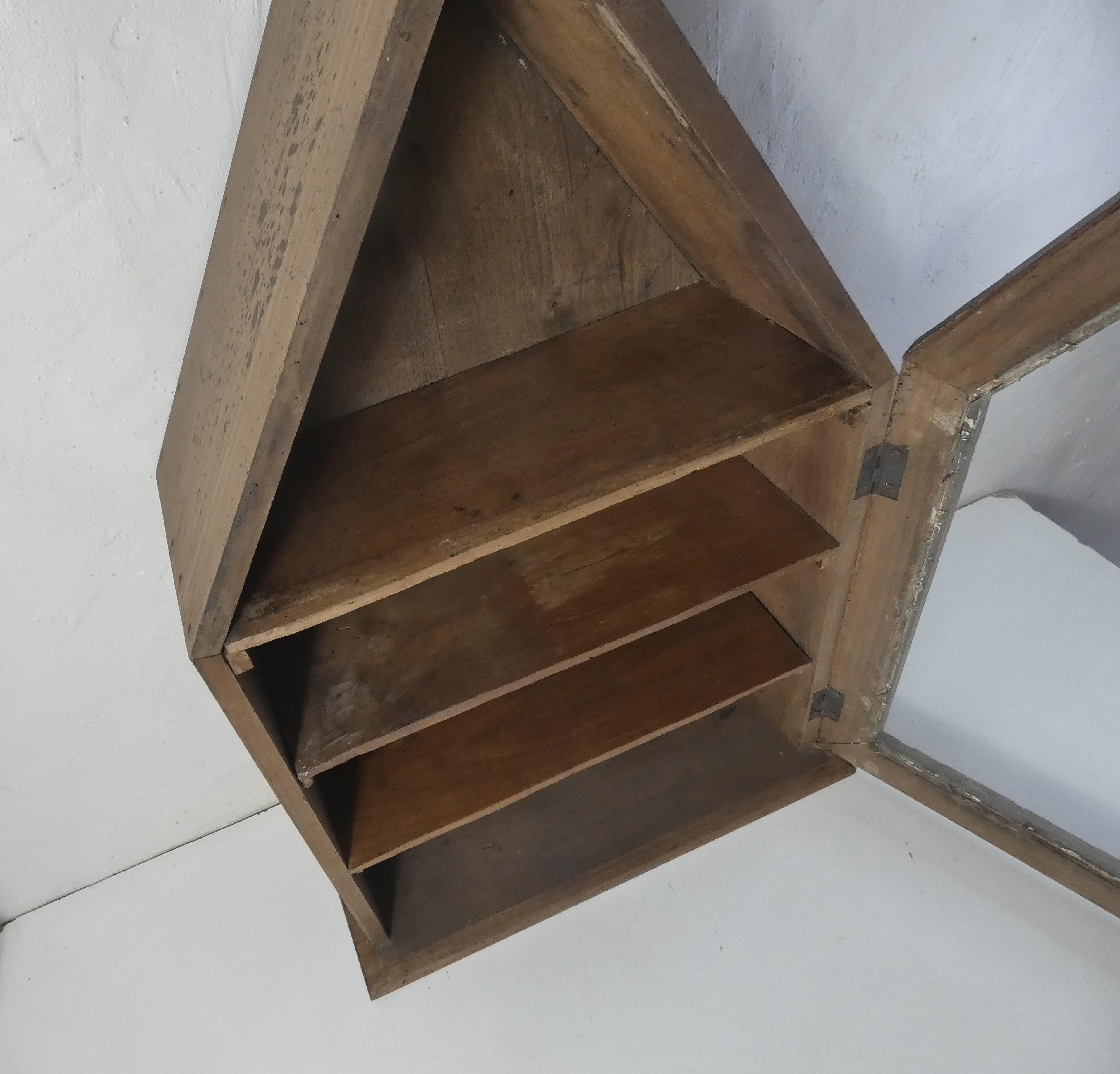 Old niche shelf with glazed statue