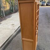 Parisian glass-fronted wardrobe in light wood from the 1960s.
