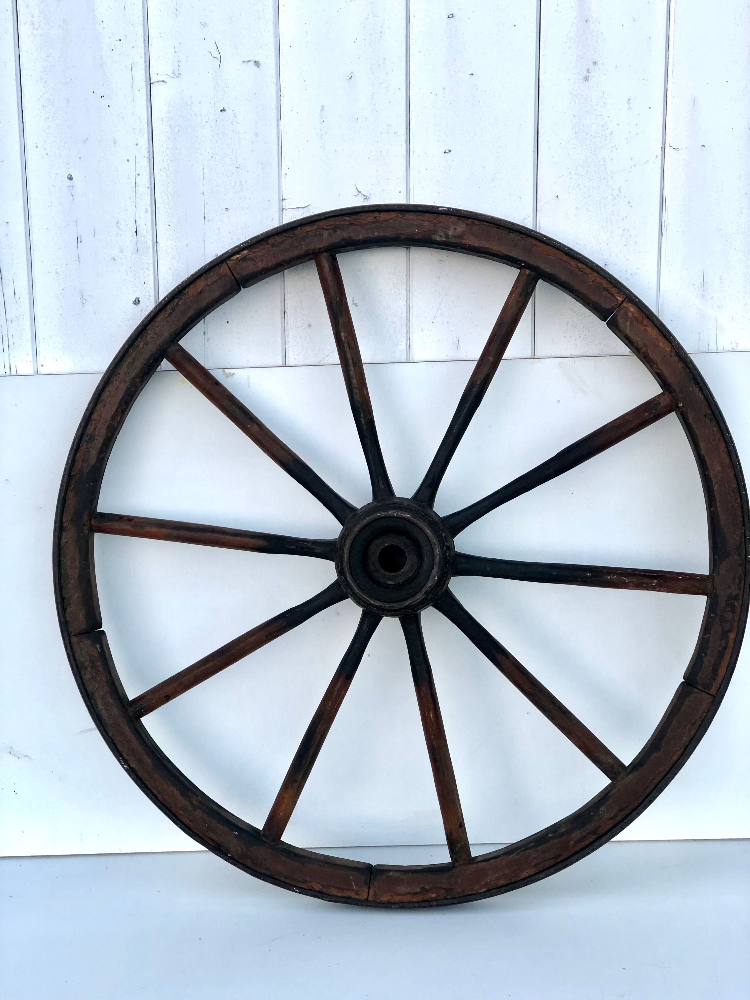 Small wooden cart wheel