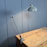 Grey two-arm Kaiser Idell clamp lamp model