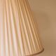 Large ceramic table lamp from West Germany with a pleated shade.
