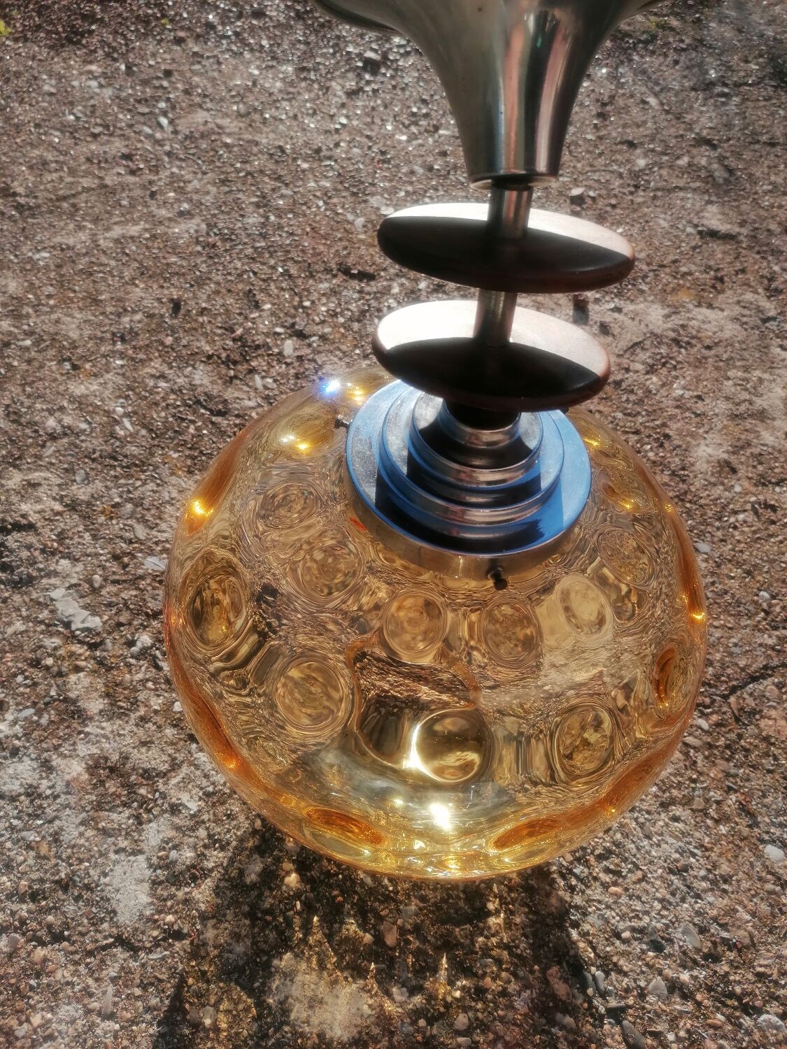 Vintage suspension ball in amber glass