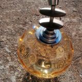 Vintage suspension ball in amber glass