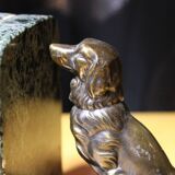 Dog book greenhouse on a marble base