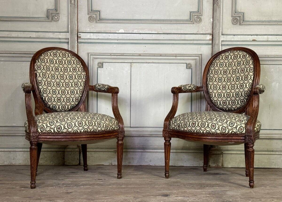 Pair Of Louis XVI Armchairs In Carved Wood, 18th Century