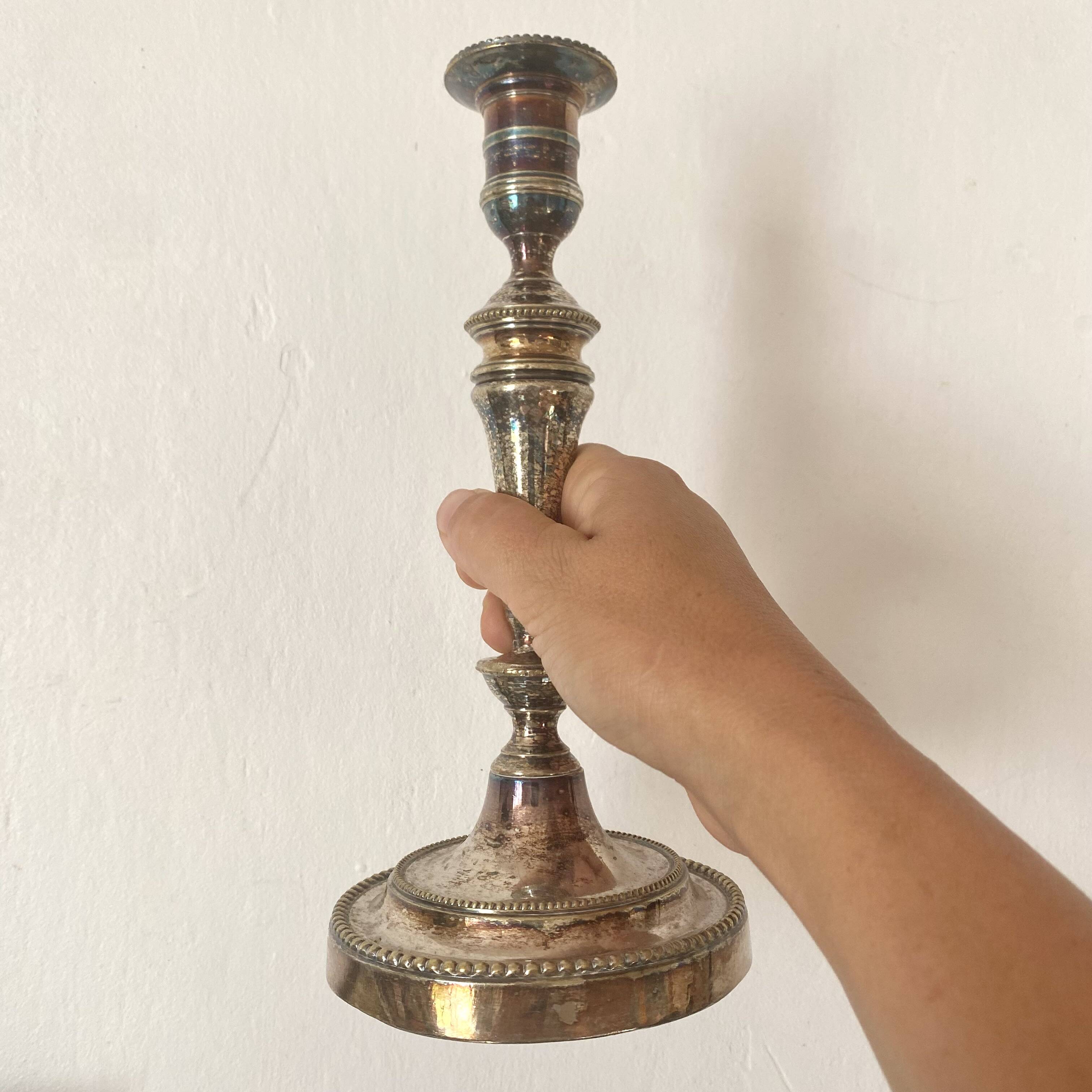 Pair of silver-plated metal candlesticks