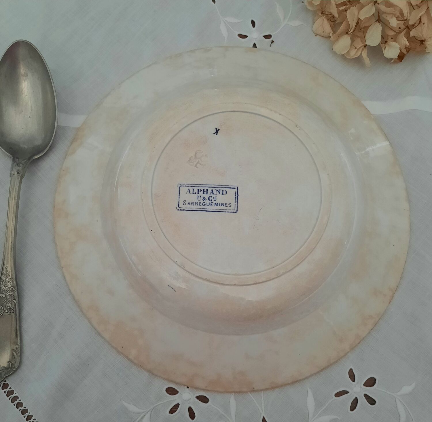 Old mismatched hollow plates in iron earth earthenware