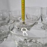 Set of Art Deco style engraved crystal bowls and glasses on spherical feet