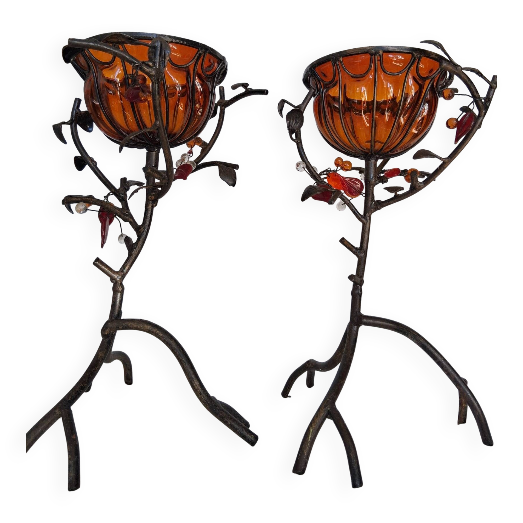 Pair of Art Deco style candle holders in wrought iron and amber blown glass.