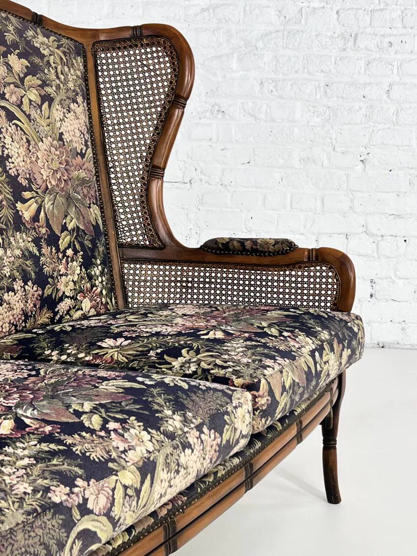 Wingback 2-seater sofa in carved wood, cane and fabric