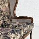 Wingback 2-seater sofa in carved wood, cane and fabric