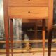 Nightstand with veneer and 4 drawers.
