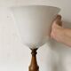 Large Art Deco lamp in Mazda style made of turned wood and opaline.