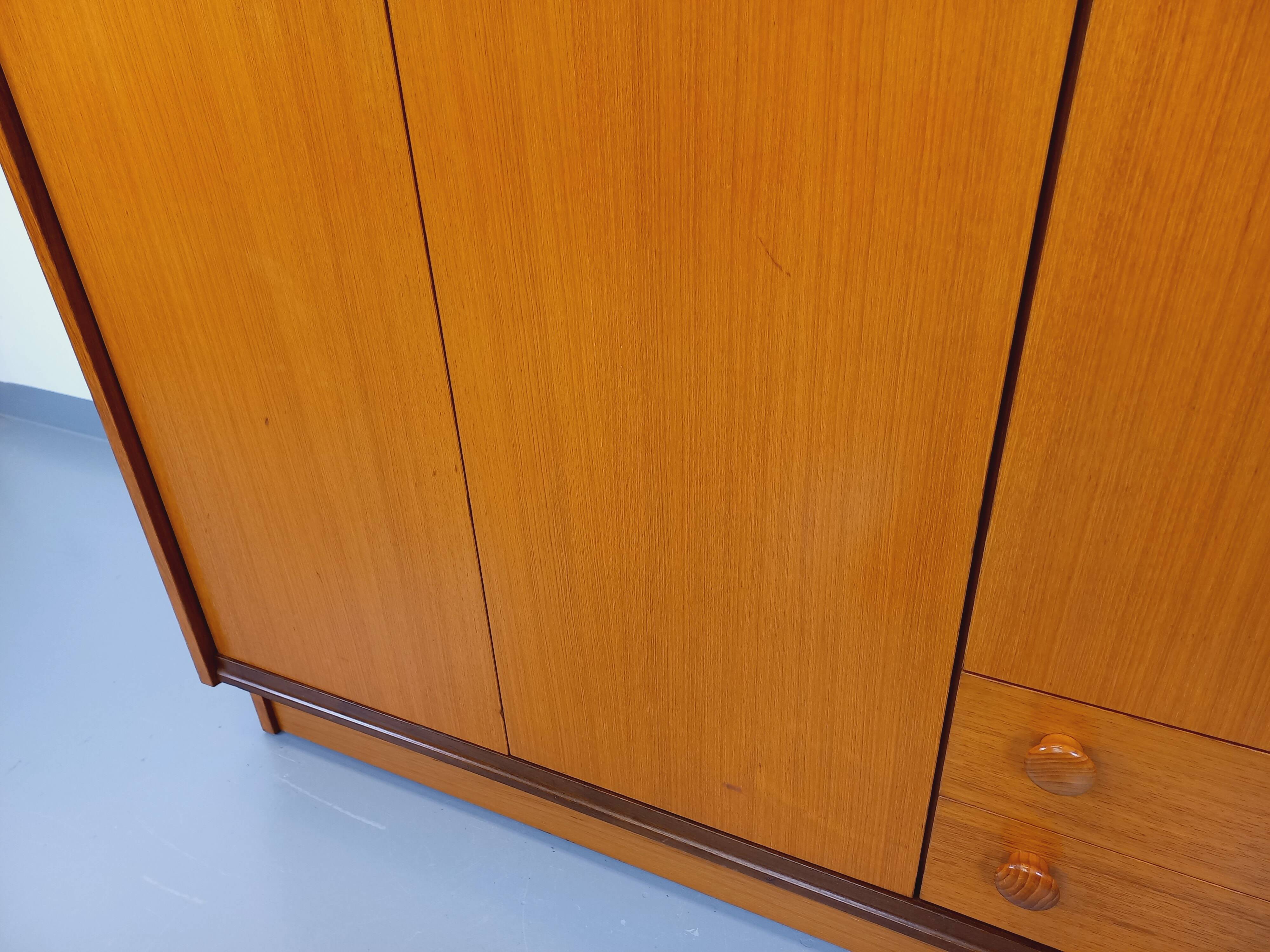 Vintage modernist teak and walnut wardrobe from the 60s and 70s