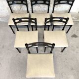 Set of six black lacquered wooden chairs.