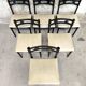6 black lacquered wooden chairs