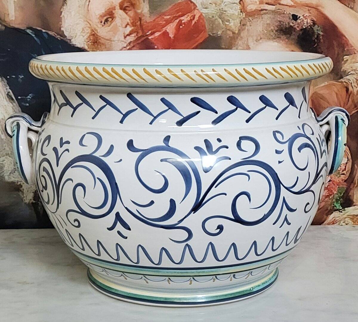 Italy early 20th century: Large cachepot or planter in glazed earthenware.