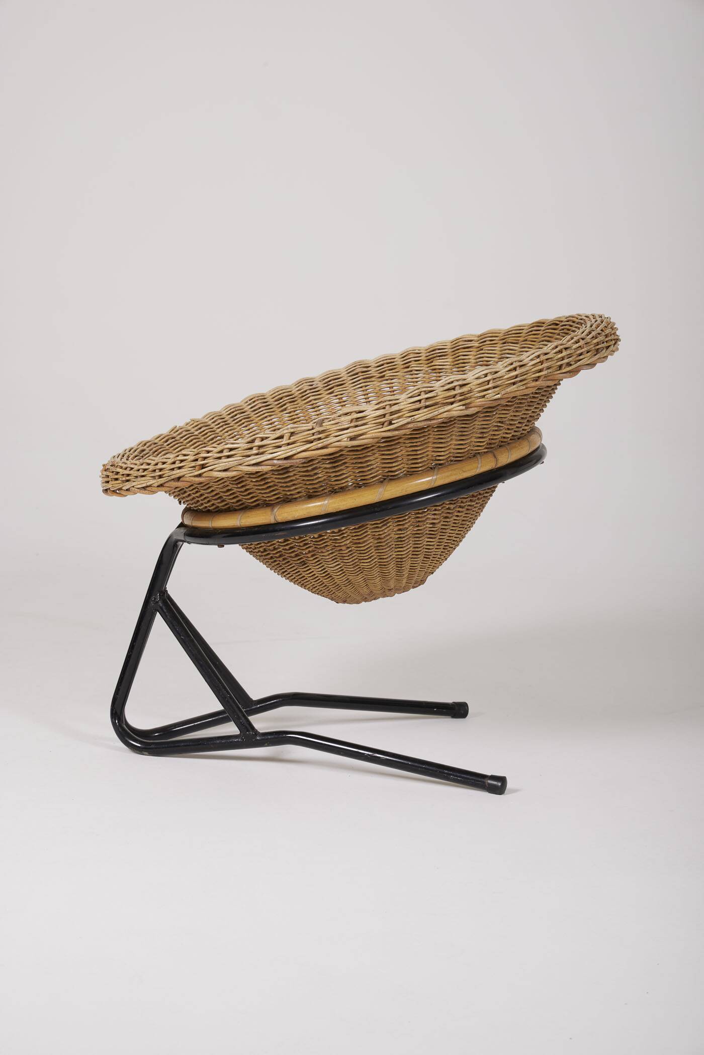 Arnold Bueno rattan and metal armchair by Mesquita