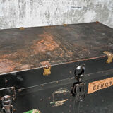 Riveted metal travel trunk