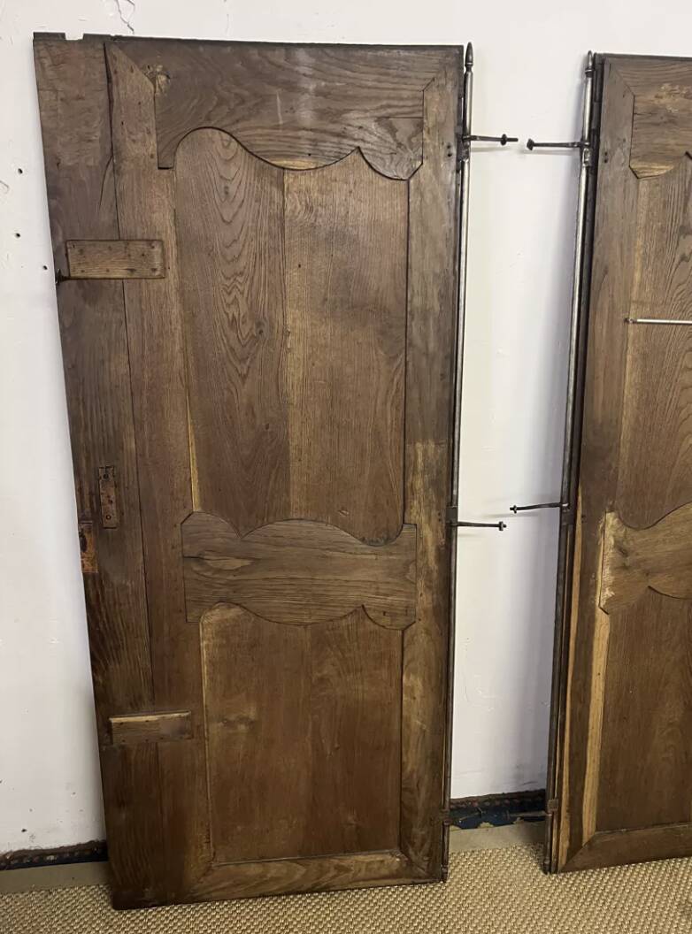 Pair of antique wardrobe doors and crosspiece