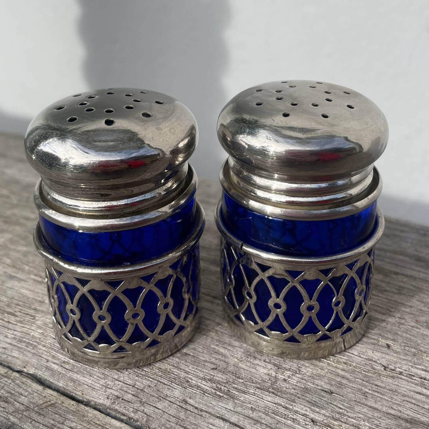 Silver-plated metal and blue glass salt and pepper shaker
