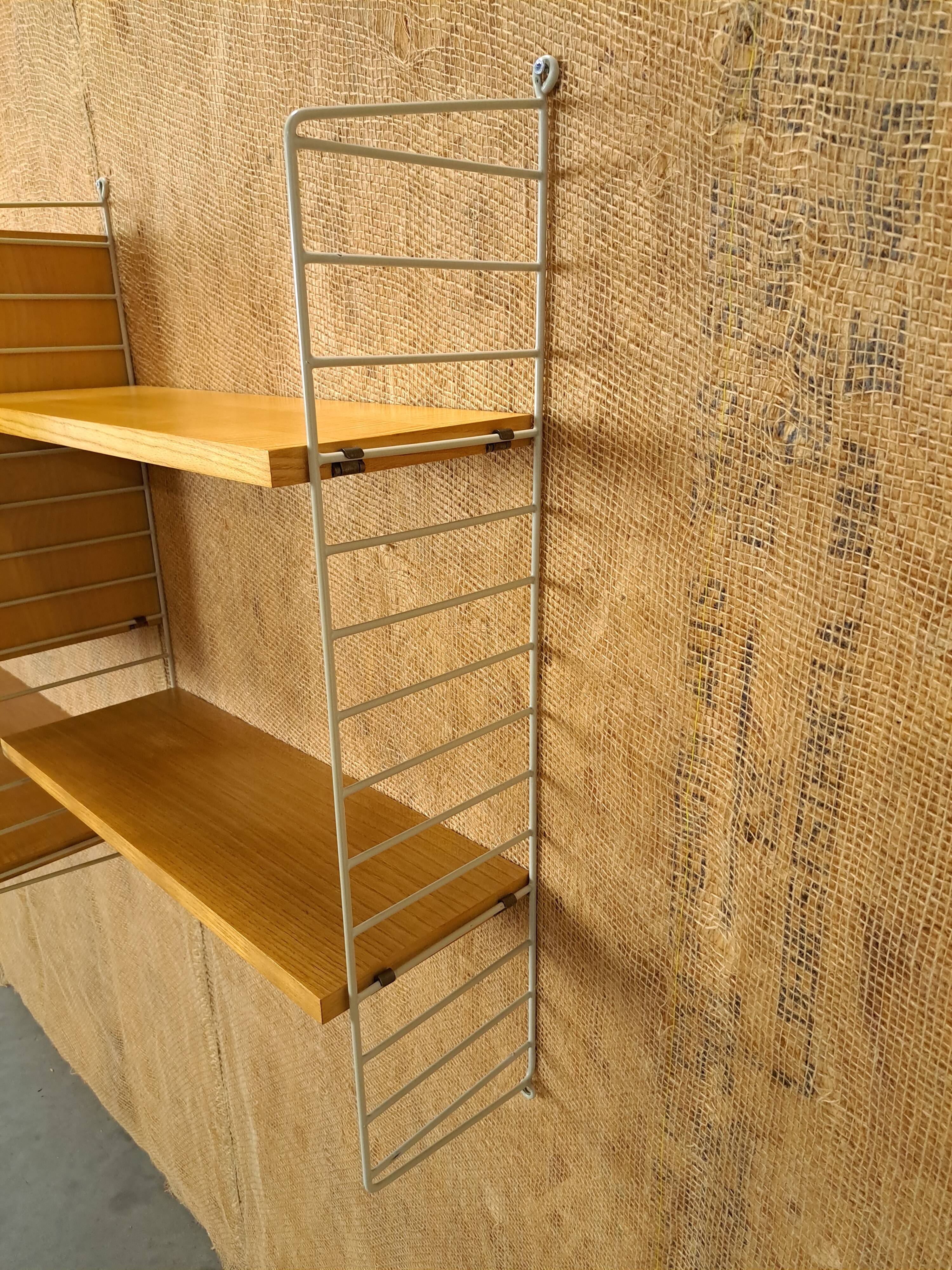 String modulair wandsysteem met kast en planken