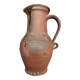 Vintage pitcher with a signature to identify.