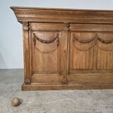 Important oak bar from a café around 1900.