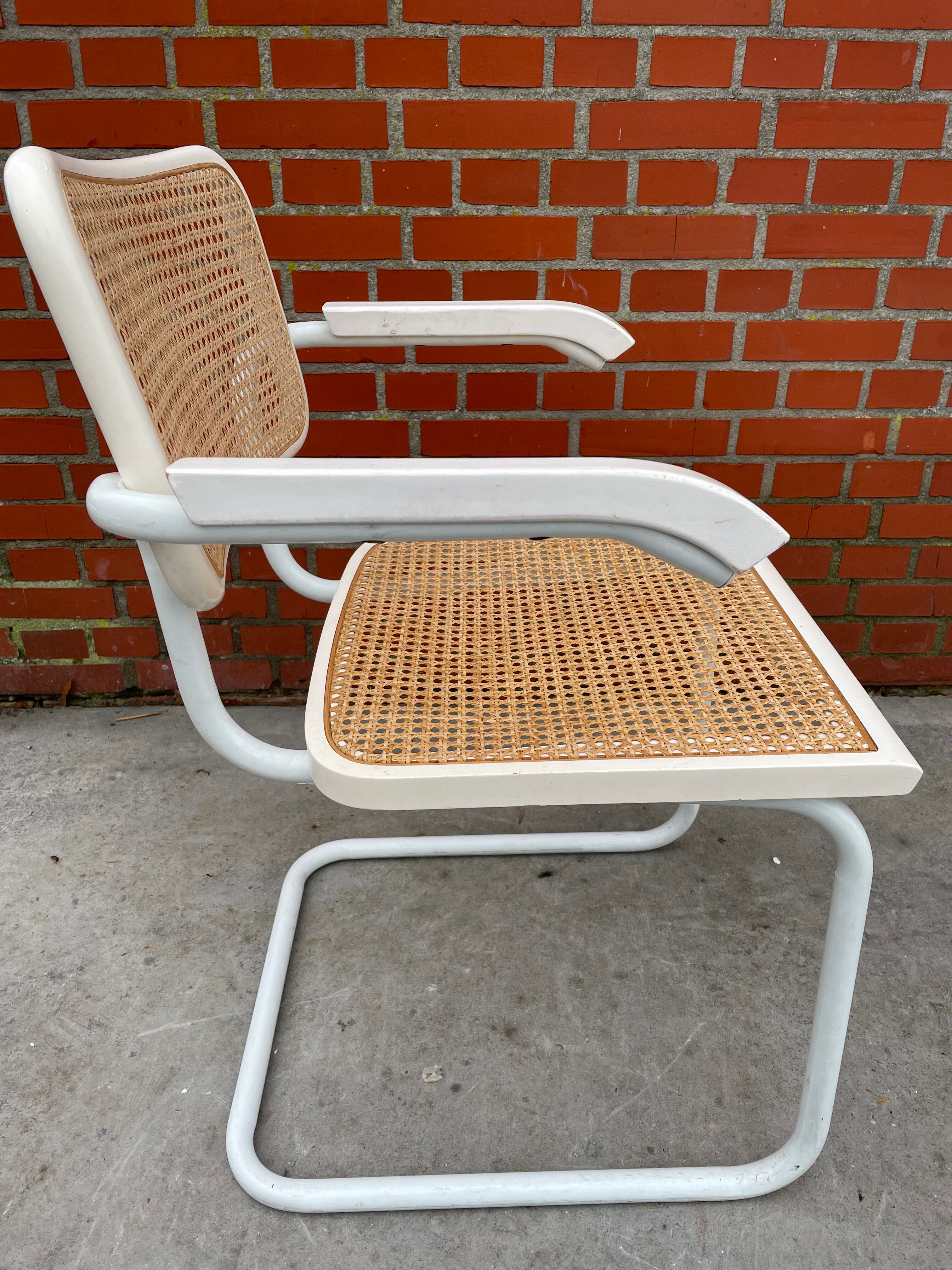 Cesca chair model with armrest in white