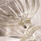 Oval glass fruit bowl on a stand.