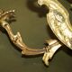 Pair of antique French wall sconces, gilded and bronzed, from the 1920s.