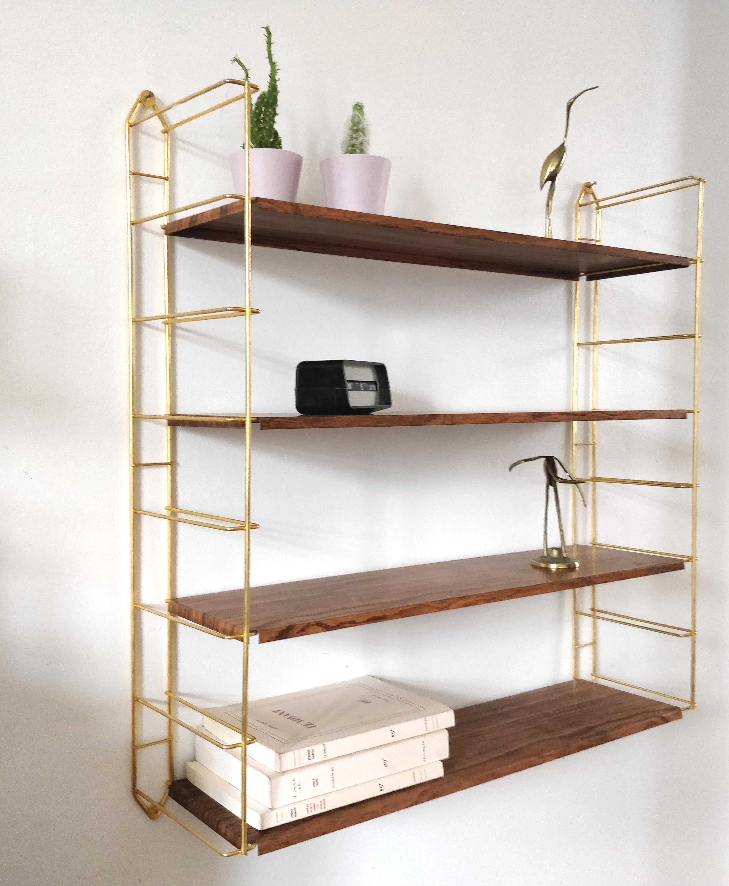 Wood-coloured metal string shelf and gold double studs 1960