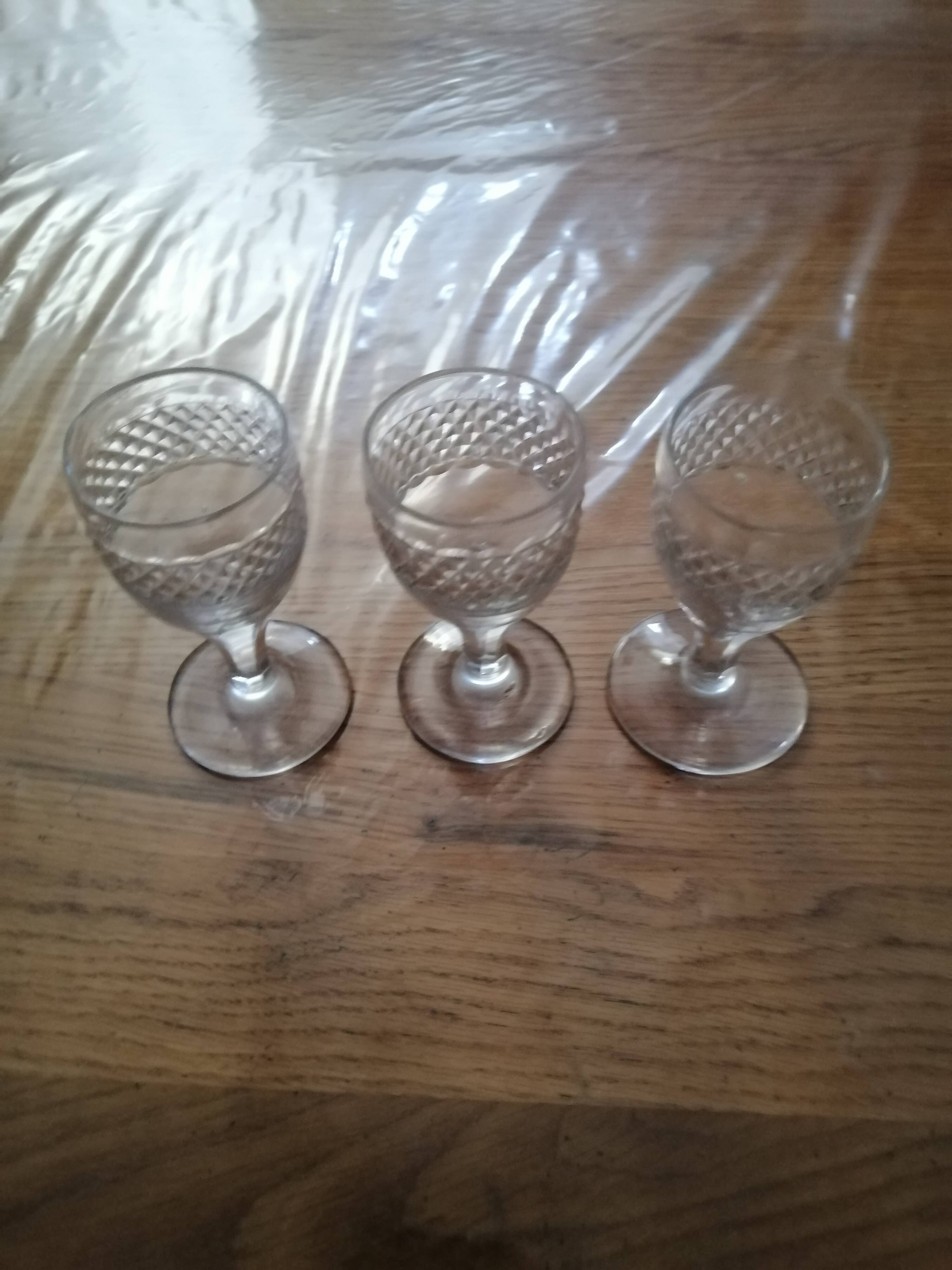 3 old vintage glass on feet