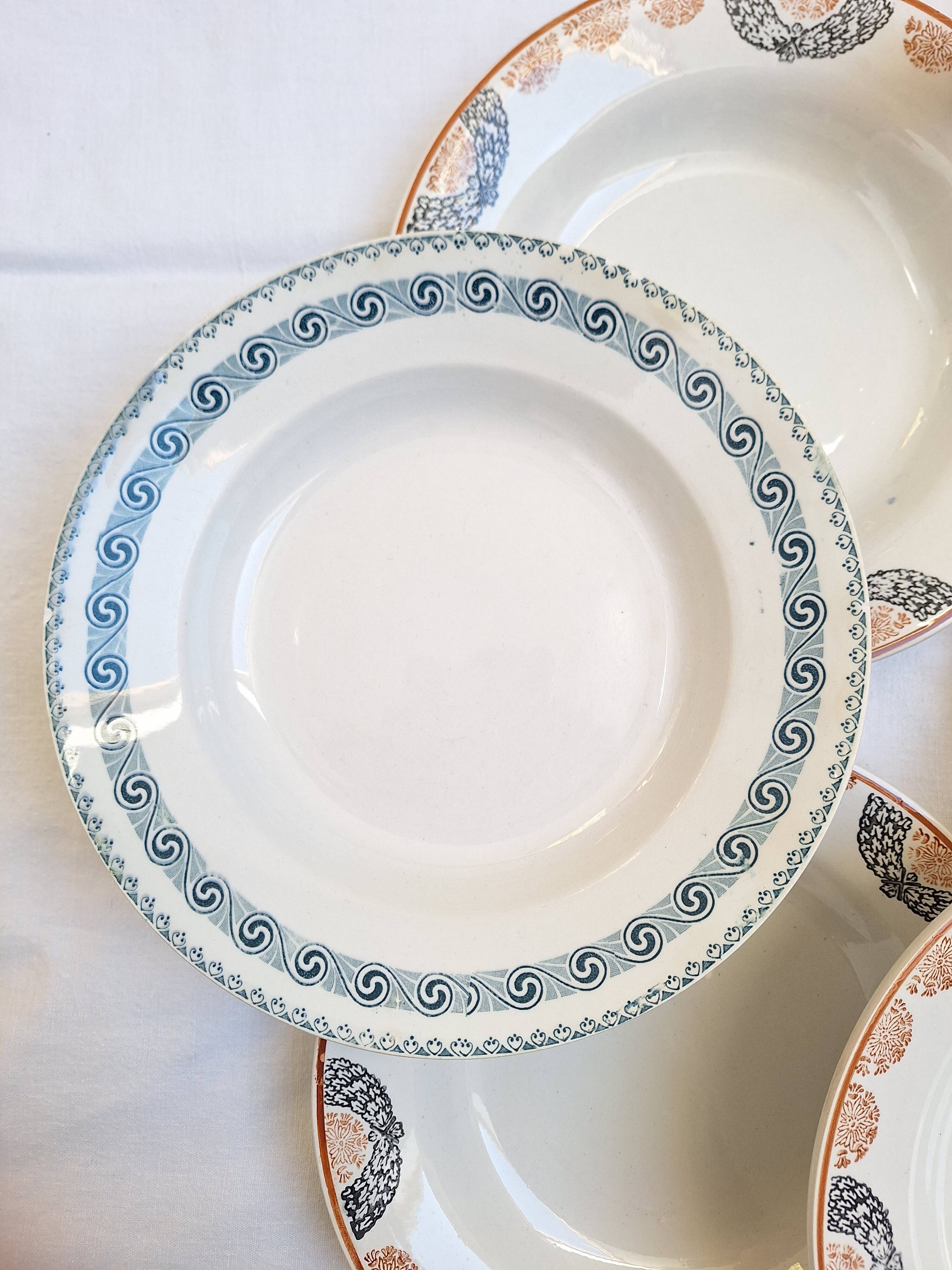 Orange and blue deep plates HBCM and St Amand.