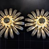 Golden metal flower sconces