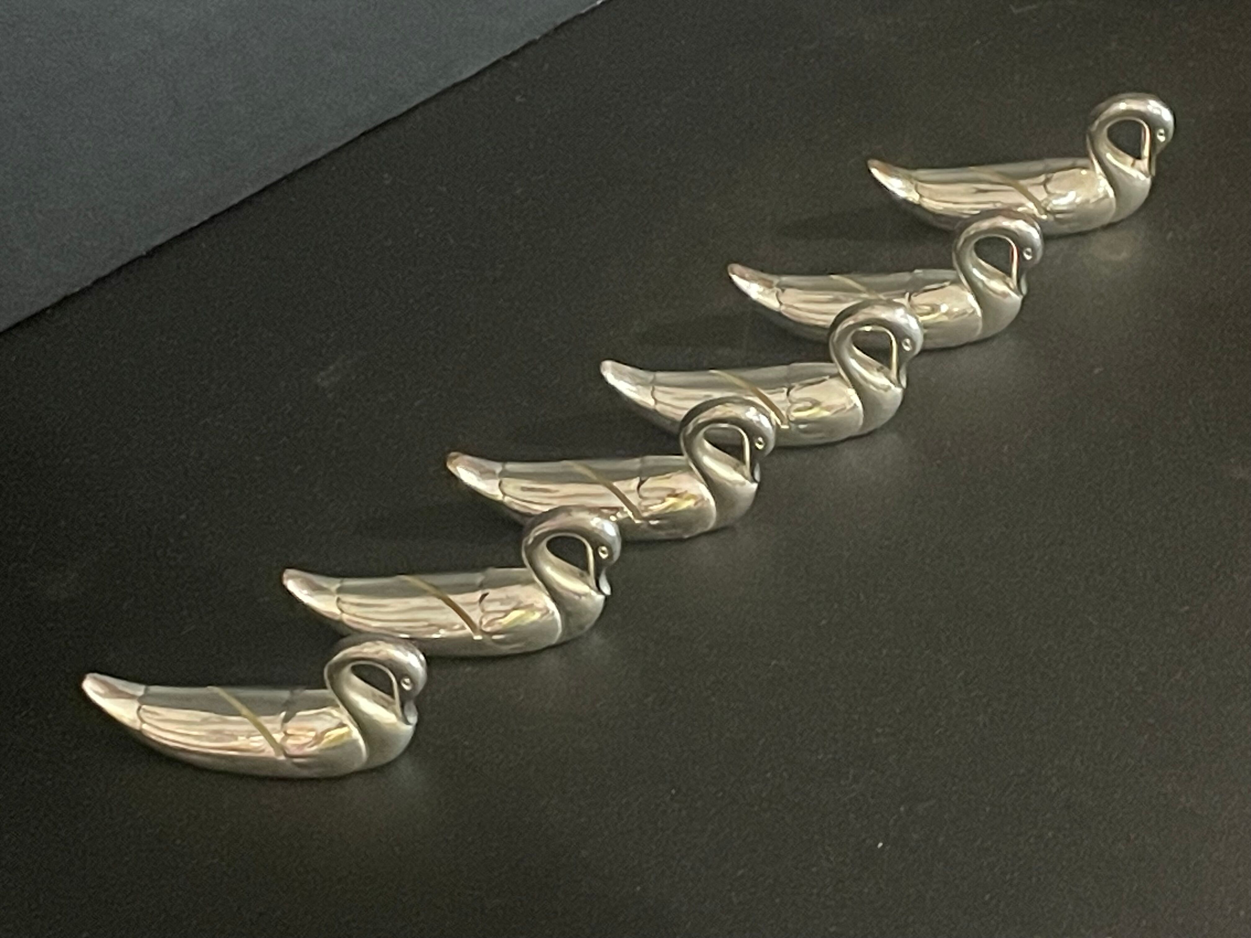 Set of 6 silver metal knife holders for table