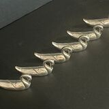 Set of 6 silver metal knife holders for table