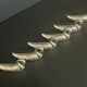 Set of 6 silver metal knife holders for table