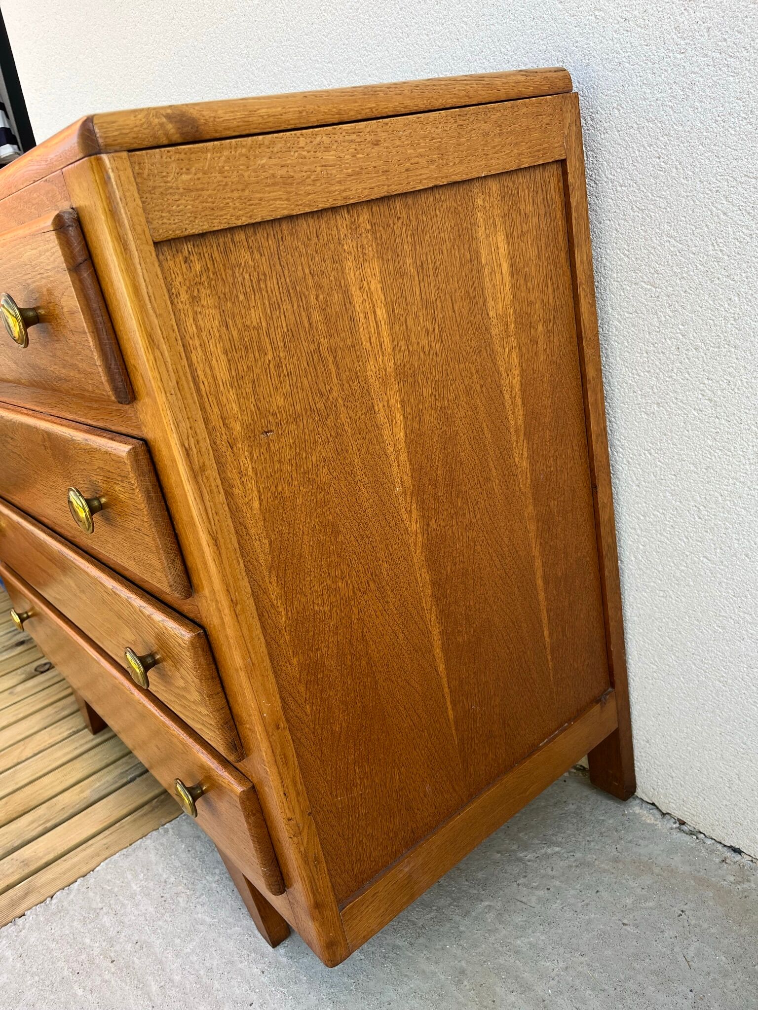 Oak art deco chest of drawers, compass legs
