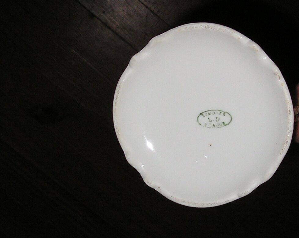 Pitcher in Limoges porcelain, barbel decoration